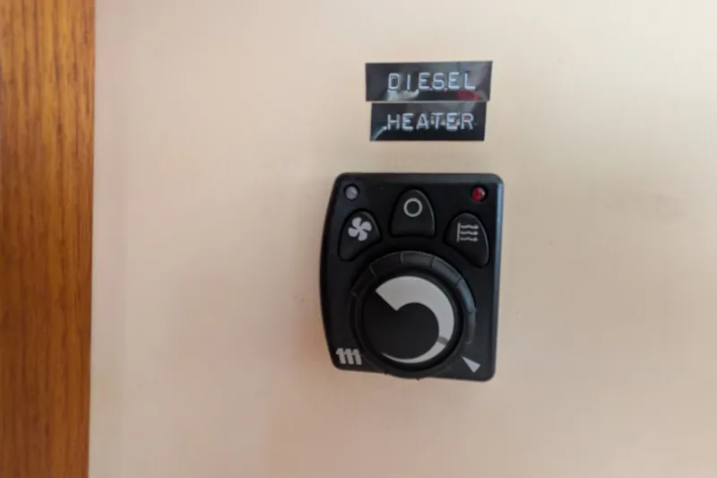 Slide: The Image of Diesel heater control panel on 1993 Nordic Tug 32 boat interior. - 48