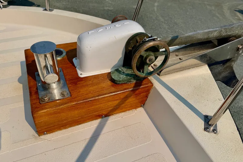 Slide: The Image of Deck equipment on a 1993 Nordic Tug 32, featuring a winch and cleat. - 50