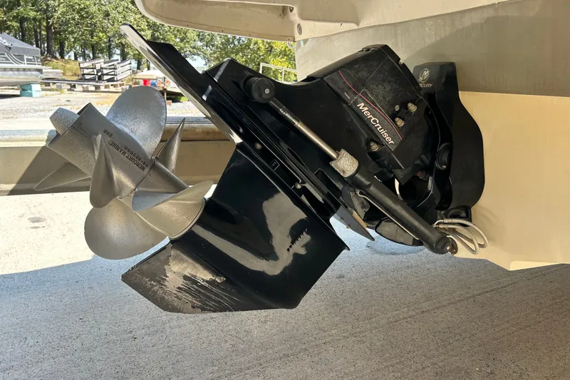 Slide: The Image of Close-up of a 2010 Sea Ray 260 Sundeck's MerCruiser outdrive and propeller. - 40