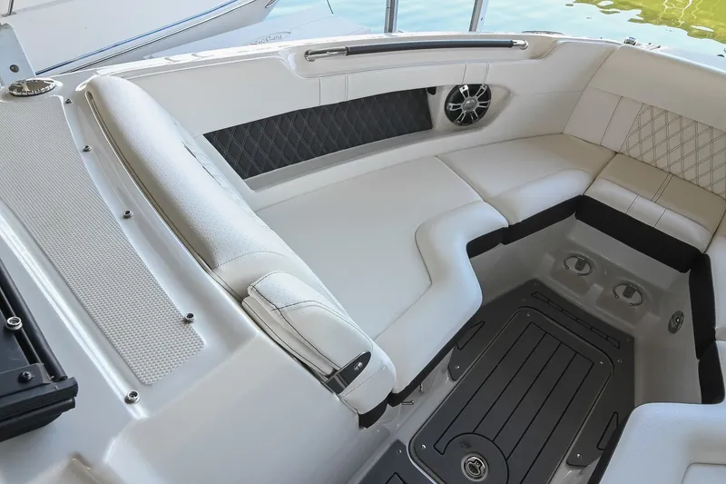 Slide: The Image of Luxurious seating area on a 2019 Sea Ray SLX 280 boat, featuring elegant upholstery. - 31