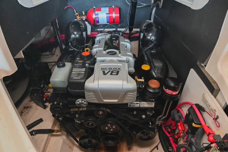 Slide: The Image of Engine compartment of a 2019 Sea Ray SLX 280 with a Big Block V8 engine. - 36