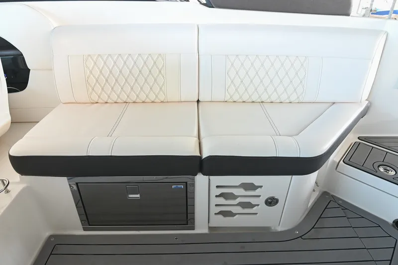 Slide: The Image of Luxurious seating on 2019 Sea Ray SLX 280 boat with diamond-stitched upholstery. - 20