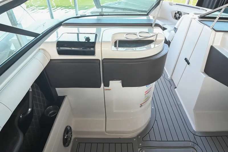 Slide: The Image of Interior view of 2019 Sea Ray SLX 280 boat, featuring sleek design and modern amenities. - 24