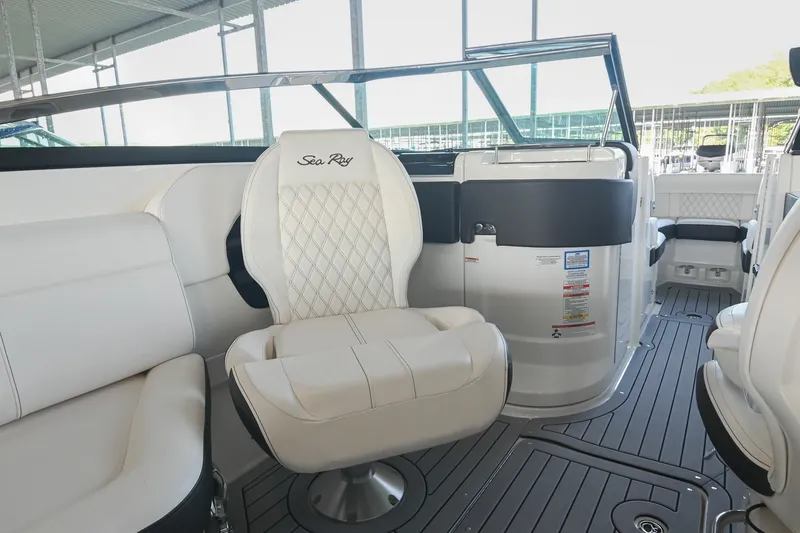 Slide: The Image of Interior of a 2019 Sea Ray SLX 280 boat with luxurious seating and modern design. - 21