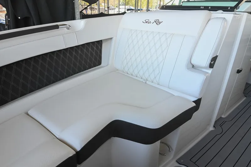 Slide: The Image of Luxurious seating on 2019 Sea Ray SLX 280 boat with elegant white upholstery. - 34