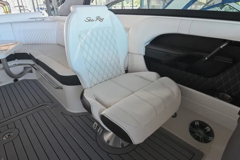 Slide: The Image of Luxurious interior of 2019 Sea Ray SLX 280 boat with plush seating and elegant design. - 25