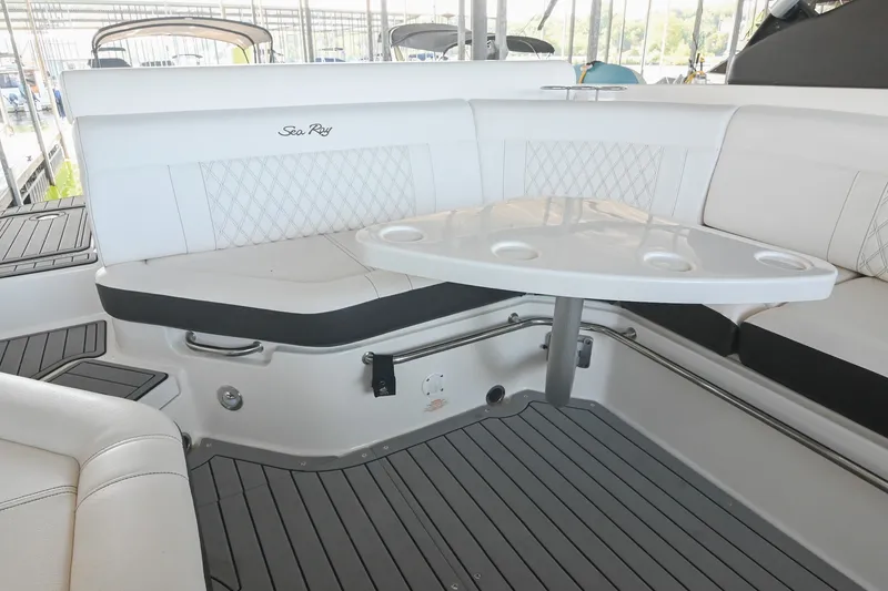 Slide: The Image of Interior of 2019 Sea Ray SLX 280 boat with seating and table. - 17