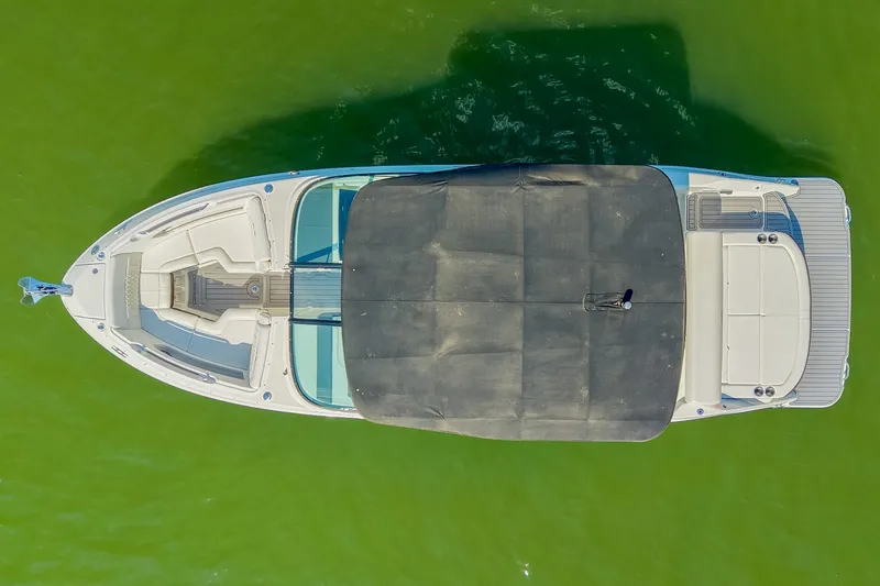 Slide: The Image of Aerial view of 2019 Sea Ray SLX 280 boat on green water. - 3