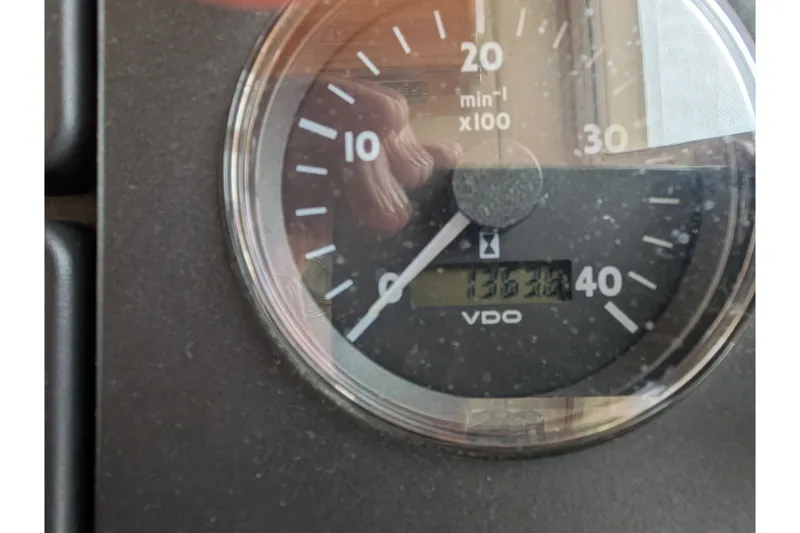 Slide: The Image of Close-up of a VDO tachometer on a 2003 Nordic Tug 37 boat. - 24