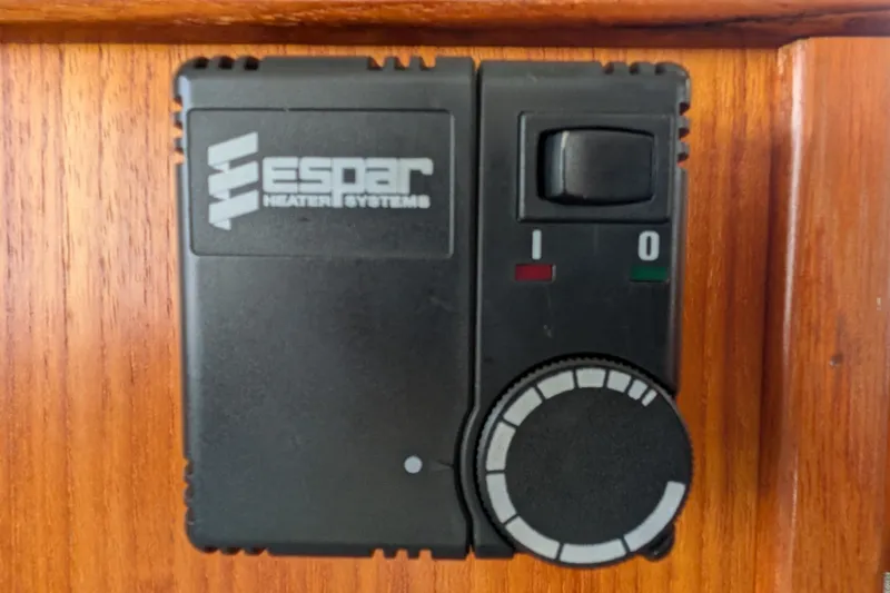 Slide: The Image of Espar Heater Systems control panel on 2003 Nordic Tug 37 boat. - 17