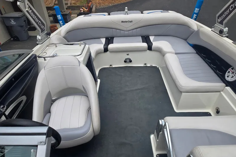Slide: The Image of 2008 MasterCraft X-35 boat interior with white seating and sleek design. - 15