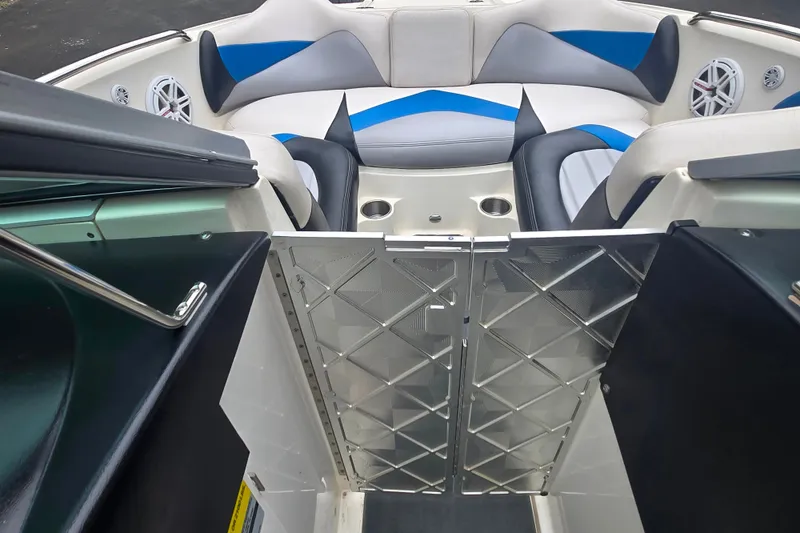 Slide: The Image of 2008 MasterCraft X-35 boat interior with stylish seating and cup holders. - 14