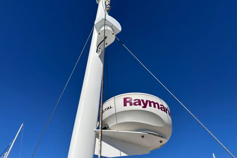 Slide: The Image of Radar equipment on 2011 Beneteau Swift Trawler 34 against clear blue sky. - 30