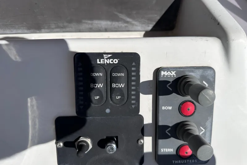 Slide: The Image of Control panel of a 2011 Beneteau Swift Trawler 34 with Lenco and Max Power controls. - 27