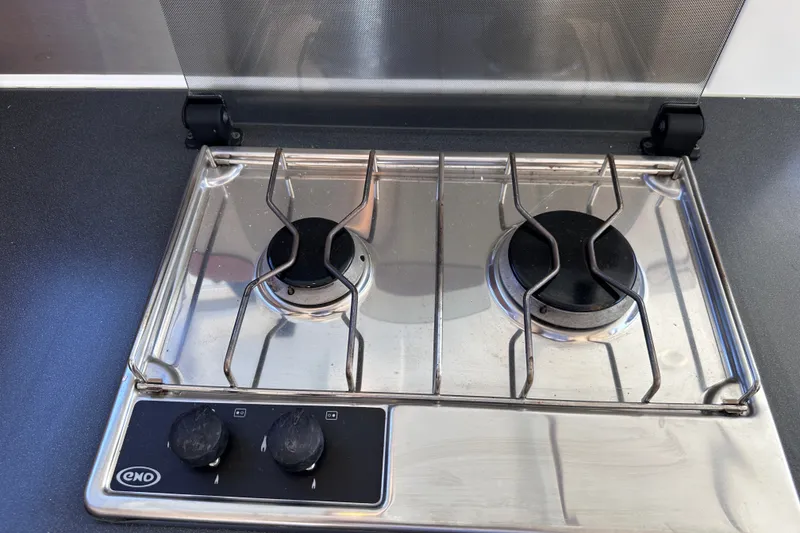 Slide: The Image of Stainless steel stove on 2011 Beneteau Swift Trawler 34 yacht, featuring two burners. - 40