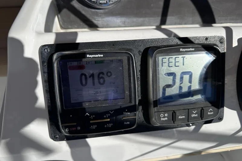 Slide: The Image of Raymarine navigation instruments on 2011 Beneteau Swift Trawler 34, displaying heading and depth. - 28