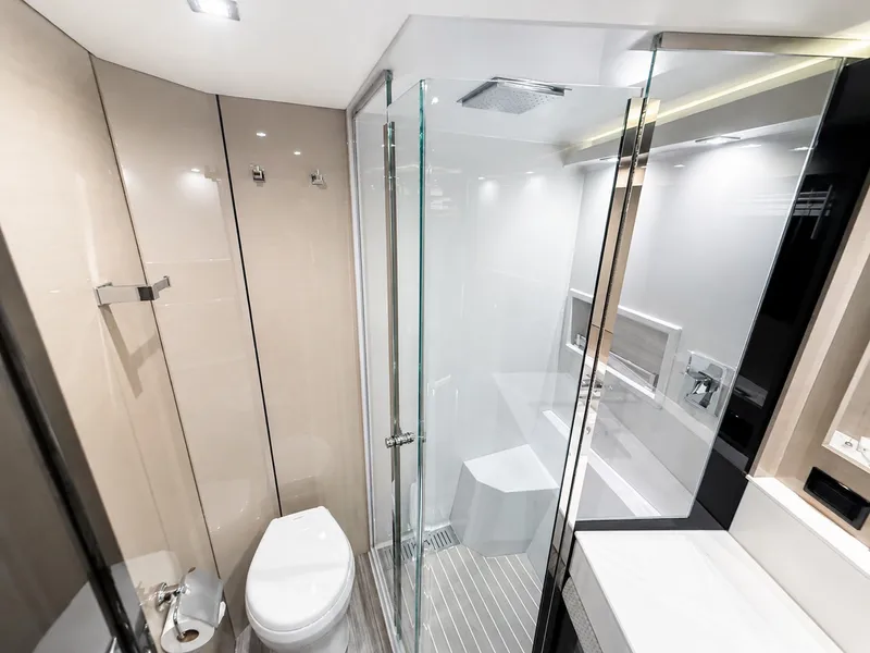 Slide: The Image of Modern bathroom with glass shower and toilet on a yacht. - 44