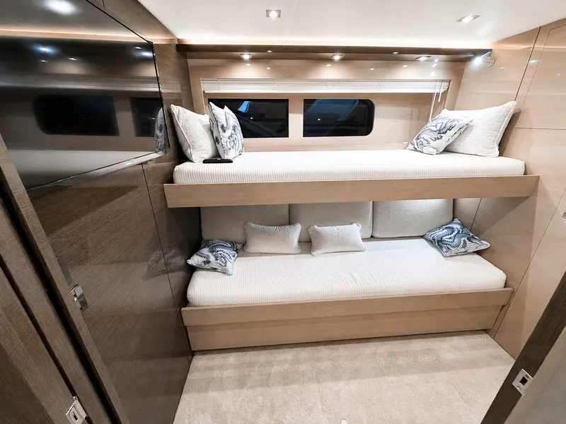 Slide: The Image of Interior of the 2019 Cruisers Yachts 60 Fly with bunk beds. - 40