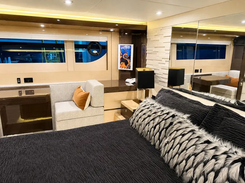 Slide: The Image of Luxurious cabin with modern design, large windows, and stylish furnishings on a Cruisers Yachts 60 Fly. - 29