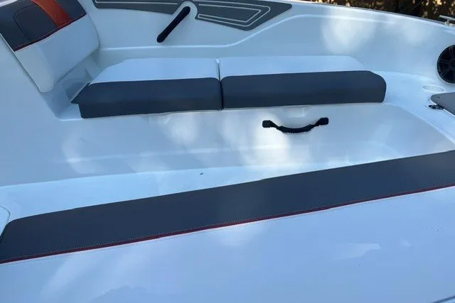 Slide: The Image of 2027 Tahoe T21 boat interior with gray and white seating, modern design. - 9