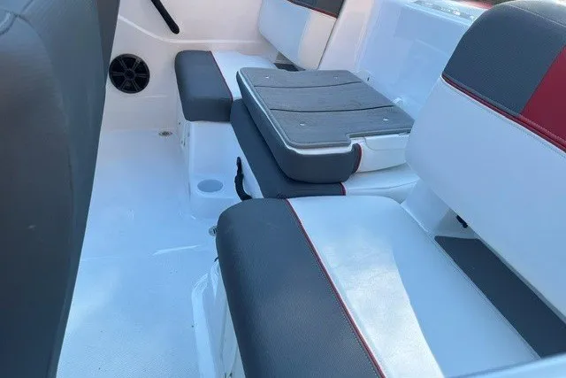 Slide: The Image of Interior seating of 2027 Tahoe T21 boat with gray and red upholstery. - 13