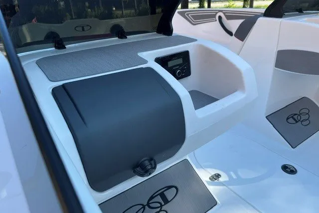 Slide: The Image of Interior of 2027 Tahoe T21 boat featuring dashboard and storage compartments. - 10