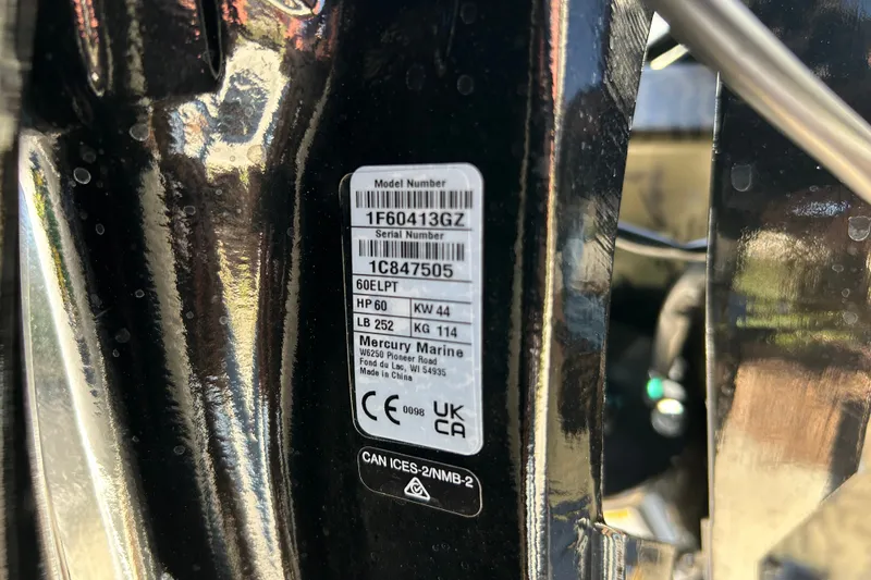 Slide: The Image of Label on Tracker Grizzly 1754 SC, 2027 model, showing specifications and serial number. - 48