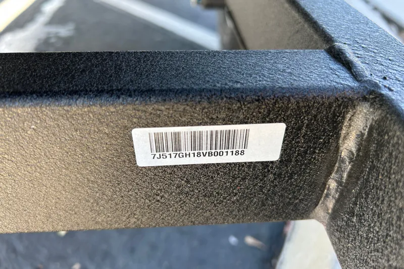 Slide: The Image of Barcode on 2027 Tracker Grizzly 1754 SC boat trailer frame. - 49