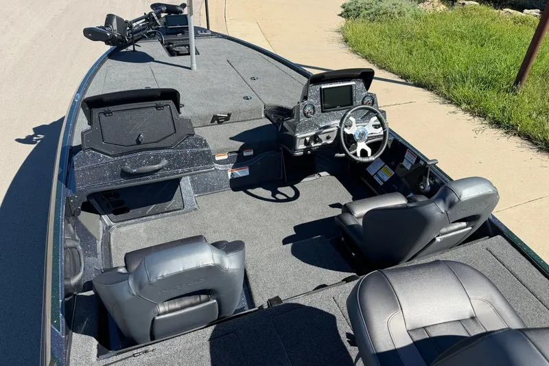 Slide: The Image of 2027 Nitro Z18 XL Pro boat interior with modern dashboard and seating. - 28