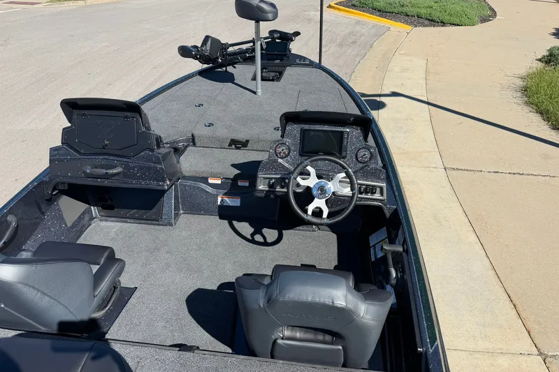 Slide: The Image of 2027 Nitro Z18 XL Pro boat interior with steering wheel and seating. - 27