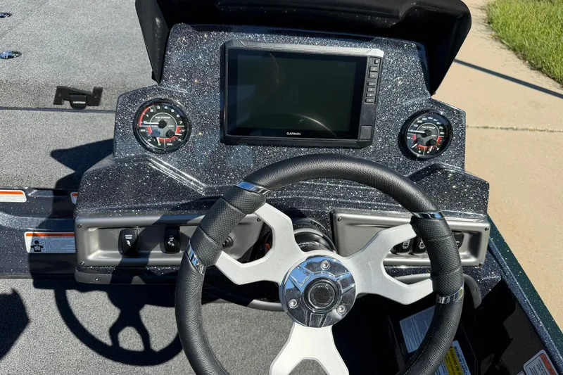 Slide: The Image of Steering console of 2027 Nitro Z18 XL Pro boat with Garmin display and gauges. - 23