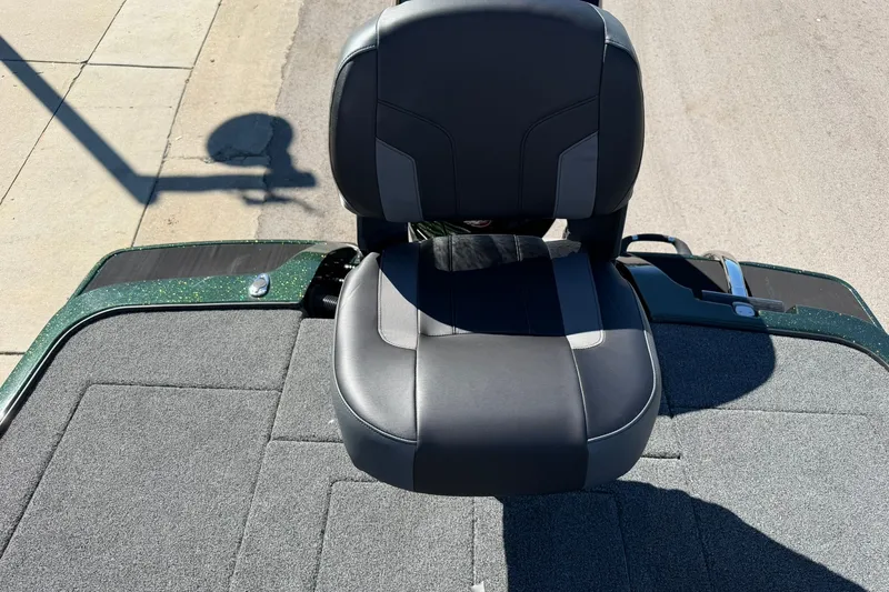 Slide: The Image of 2027 Nitro Z18 XL Pro boat seat on a textured deck, outdoor setting. - 26