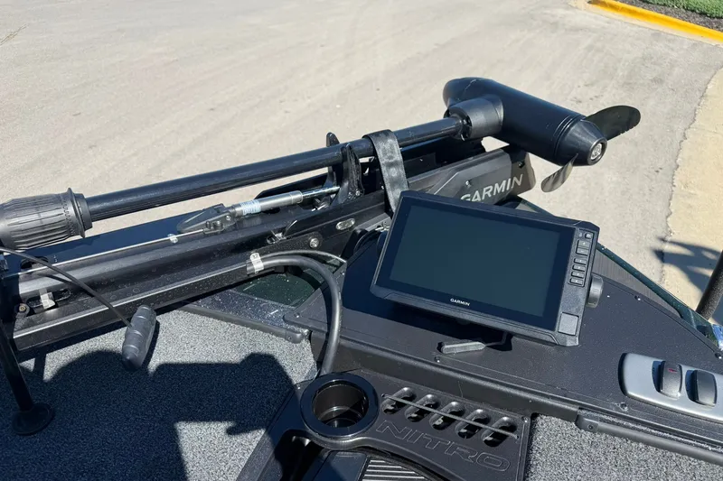 Slide: The Image of 2027 Nitro Z18 XL Pro boat dashboard with Garmin navigation system and trolling motor. - 16