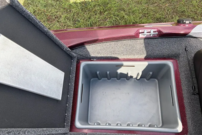 Slide: The Image of Open storage compartment in a 2027 Nitro Z17 boat, featuring a spacious interior. - 14