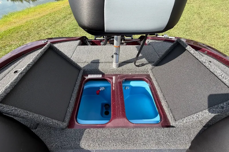 Slide: The Image of 2027 Nitro Z17 boat interior with open storage compartments and seating. - 17