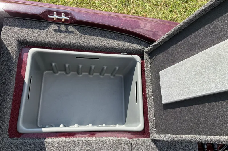 Slide: The Image of Open storage compartment in a 2027 Nitro Z17 boat, featuring a spacious interior. - 15
