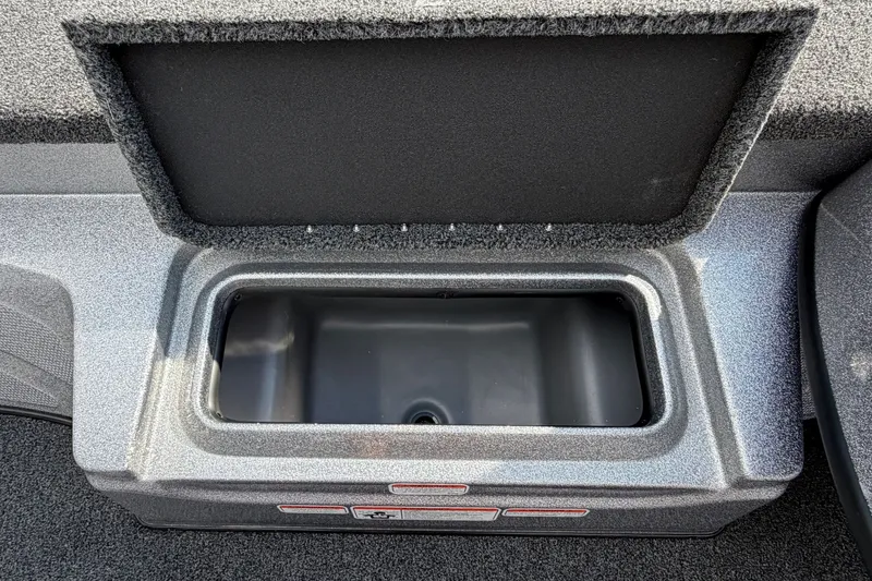 Slide: The Image of Open storage compartment in a 2027 Nitro Z17 boat, featuring a sleek design. - 13