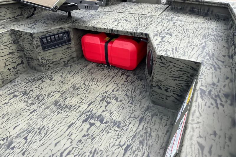 Slide: The Image of Interior of 2027 Tracker Grizzly 1650 T Prairie Wings Edition with red fuel tank. - 14