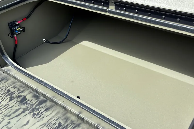 Slide: The Image of Storage compartment of 2027 Tracker Grizzly 1650 T Prairie Wings Edition boat, featuring wiring details. - 15