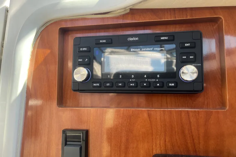 Slide: The Image of Clarion stereo system on 2007 Cruisers Yachts 280 CXi Express dashboard. - 7