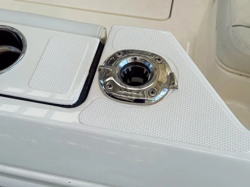 Slide: The Image of Close-up of a stainless steel cup holder on a white boat. - 12