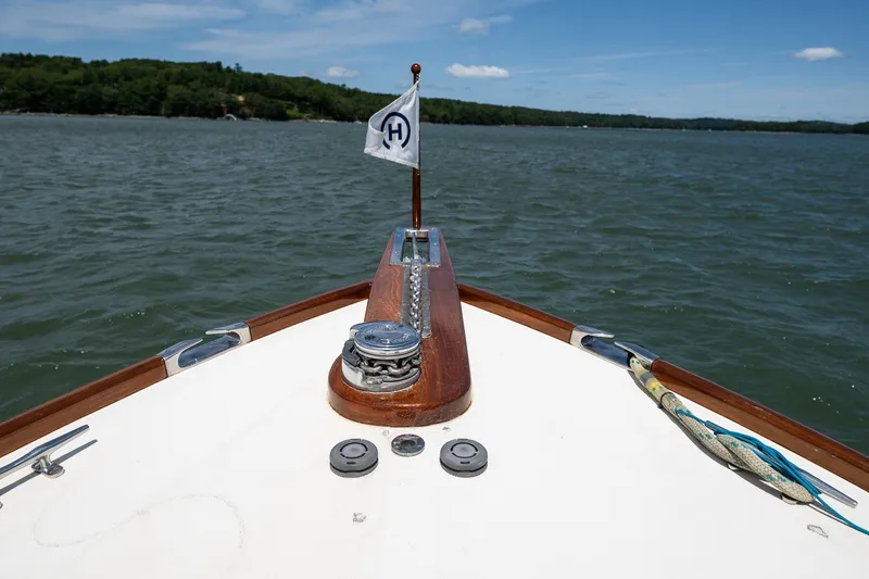 Slide: The Image of Bow view of 2000 Hinckley Picnic Boat 36 Classic on calm waters. - 10