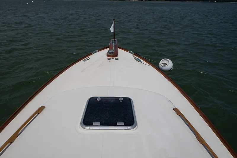 Slide: The Image of Bow view of 2000 Hinckley Picnic Boat 36 Classic on water. - 9