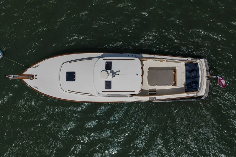 Slide: The Image of Top view of a 2000 Hinckley Picnic Boat 36 Classic on water. - 6