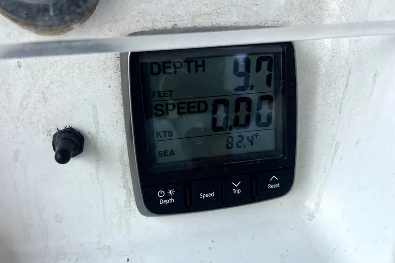 Slide: The Image of Depth gauge on 2006 Beneteau Oceanis 393 showing 9.7 feet, speed 0.00 knots. - 65