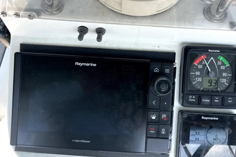 Slide: The Image of Raymarine navigation system on 2006 Beneteau Oceanis 393 sailboat dashboard. - 71