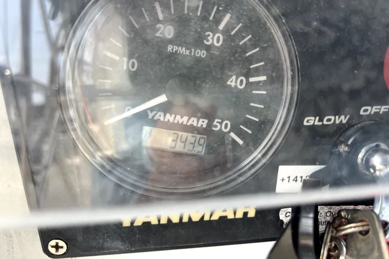 Slide: The Image of Yanmar engine tachometer displaying 3439 hours on a 2006 Beneteau Oceanis 393 sailboat. - 72