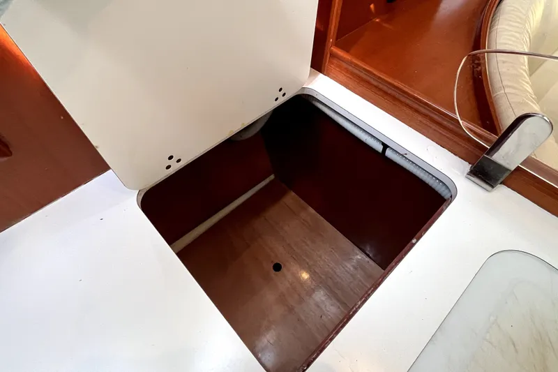 Slide: The Image of Open storage compartment on 2006 Beneteau Oceanis 393 sailboat interior. - 26