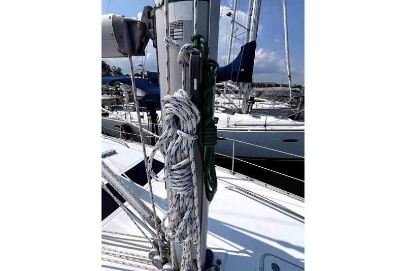Slide: The Image of Beneteau Oceanis 393 sailboat deck with ropes and mast, 2006 model. - 62