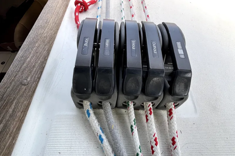 Slide: The Image of Close-up of rope clutches on a 2006 Beneteau Oceanis 393 sailboat deck. - 76